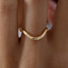 Curved-Geometric-Pattern-Gold-Wedding-Band-Closeup