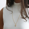 Gold-Bucket-Pendant-Necklace-with-Sapphire-On-Model