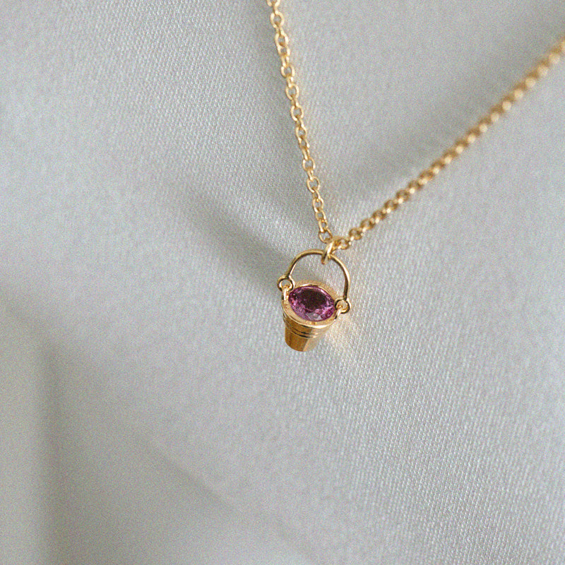 Gold-Bucket-Pendant-Necklace-with-Sapphire-Top-Angle