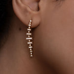 Gossamer-Baguette-Diamond-Dangle-Earrings-Curved