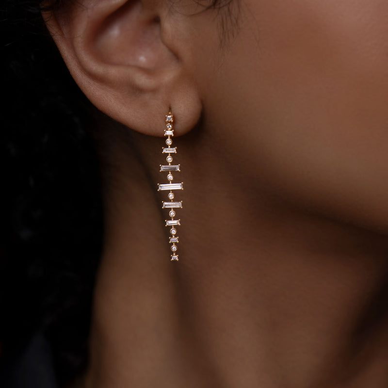 Gossamer-Baguette-Diamond-Dangle-Earrings-On-Model