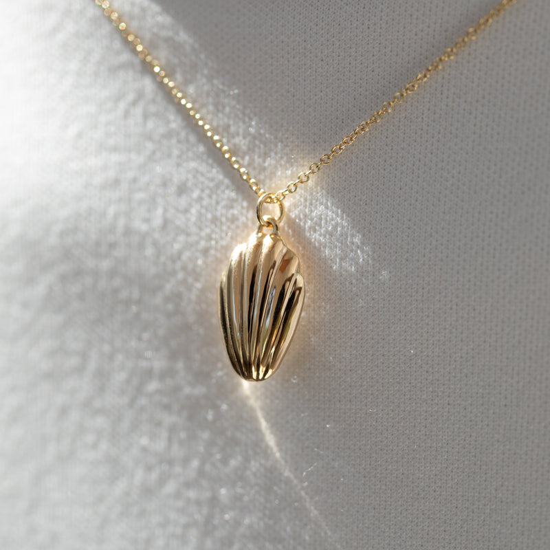 Madeleine-Cookie-Pendant-Necklace-in-Solid-Gold-Angle-Closeup