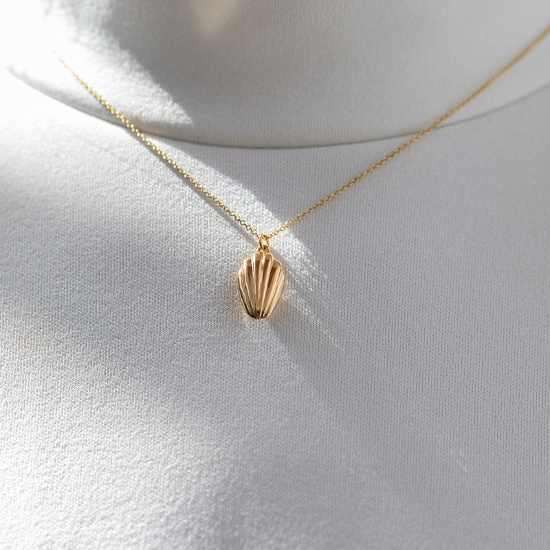 Madeleine-Cookie-Pendant-Necklace-in-Solid-Gold-Angled-Up