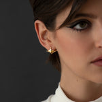 Modern-18K-Gold-Pointed-Wide-Huggie-Earrings-Model-Side