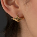 Modern-18K-Gold-Pointed-Wide-Huggie-Earrings-Side-Closeup