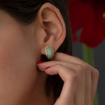 Paraiba-Tourmaline-Pave-Huggie-Earrings-Flower-Background