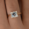 Tilted-Sky-Blue-Sapphire-Ring-with-Diamond-Frame-Closeup