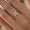 Tilted-Sky-Blue-Sapphire-Ring-with-Diamond-Frame-Midshot