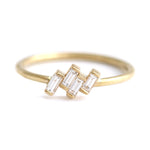 Four Baguette Cut Diamonds Set In A Tilted Composition